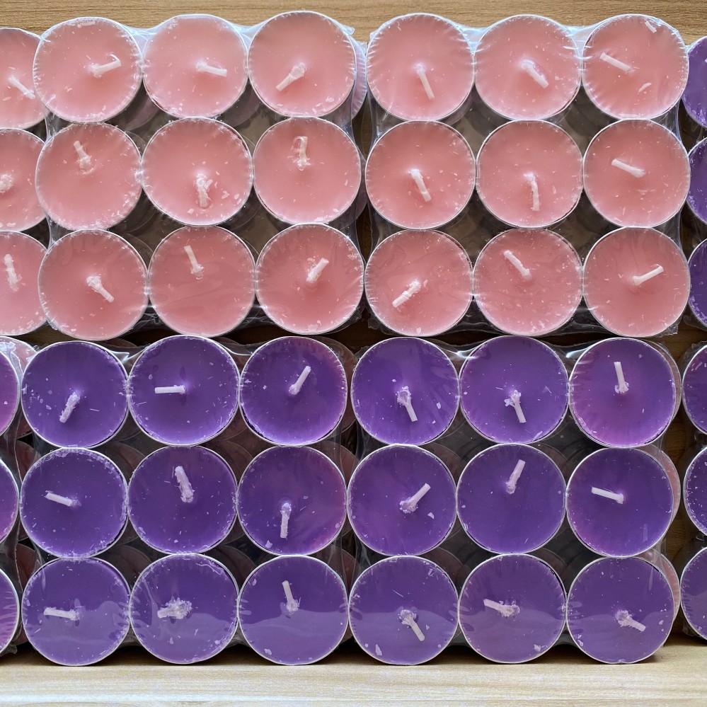 Wholesale purple tealight candles, bulk colored tea lights with silver cups for home decoration and events